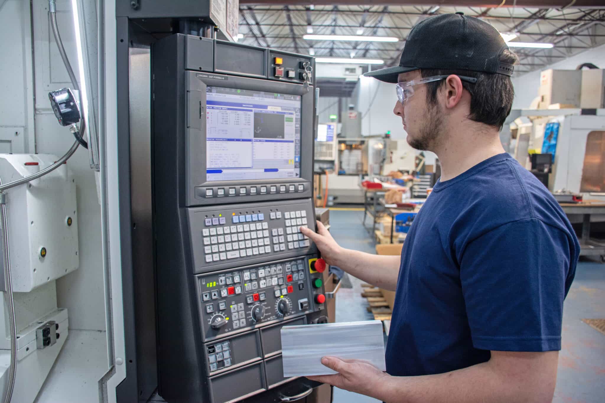 CNC Precision Machining 17 Xtproto's CNC engineer is operating the machine