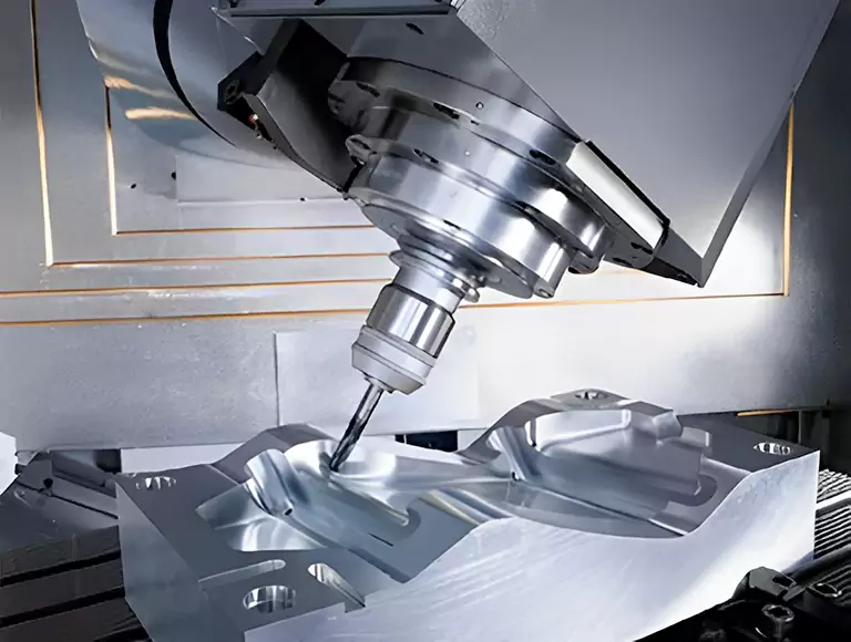 4 Axis CNC Machining: How It Works, Benefits & Applications 2 Close-up of a 4-axis CNC machining process showing the workpiece in precise contact with the rotating fixture, as the cutting tool moves along X, Y, Z, and A axes to create complex surfaces and accurate holes.