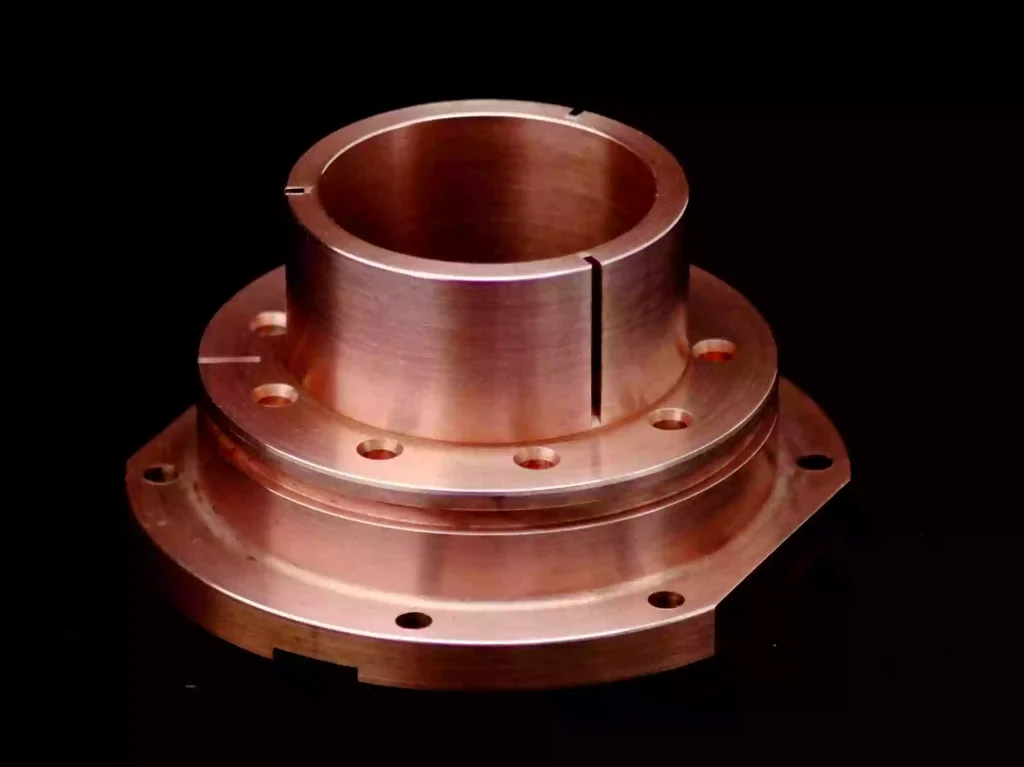 CNC Machining Copper: The Ultimate Guide to Grades, Techniques, and Industry Applications 1 High-precision CNC machined copper heat sink with complex cooling fins, showing excellent surface finish and thermal conductivity properties.