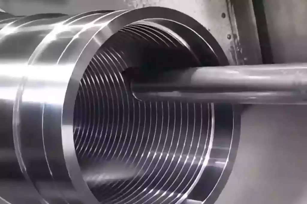 The Ultimate Guide to CNC Threading: Methods, Design Tips, and Troubleshooting 1 Metal screw close-up showing helical threads, emphasizing the precision of CNC thread machining.