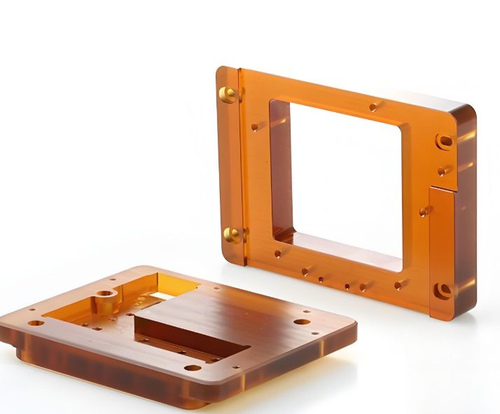 The Technical Guide to Ultem (PEI) CNC Machining: Properties, Grades, and Process Control 3 A display of finished, high-precision machined Ultem PEI components, including a detailed electronic connector housing, a medical device housing, and lightweight aerospace structural parts.