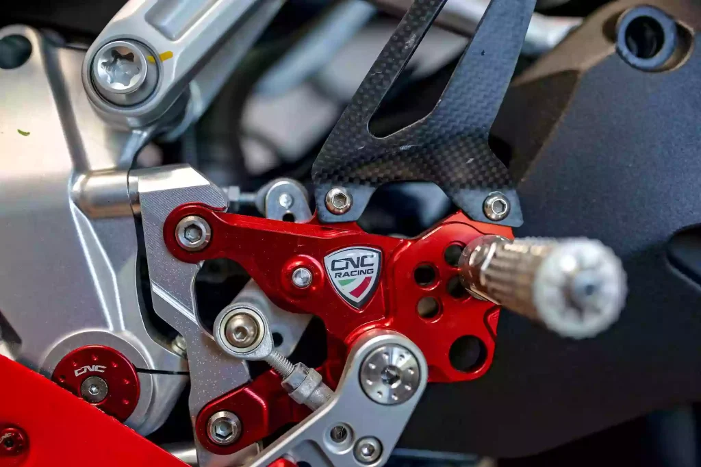 CNC Machined Motorcycle Parts: Design and Manufacturing Guide 2 A lightweight CNC machined motorcycle component featuring pocketed structures, optimized wall thickness, and weight-reduction features designed to improve strength-to-weight performance while maintaining structural rigidity.
