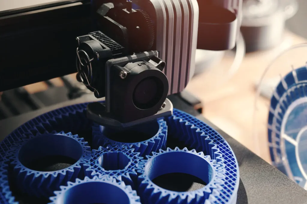 Hybrid Manufacturing Technology: Combining 3D Printing and CNC Machining 3 3D printing finishing a complex component produced through hybrid manufacturing, improving precision features and surface finish.