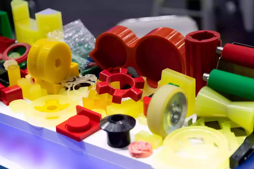 ABS Plastic: How to Select the ABS Material 1 A diverse range of ABS plastic parts illustrating its flexibility, durability, and suitability for industrial manufacturing and product design.